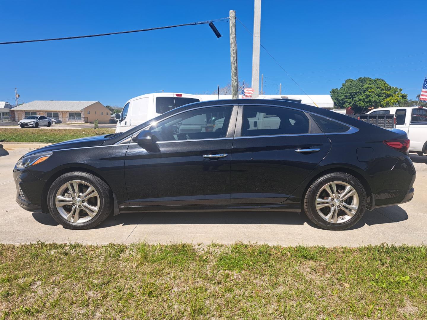 2019 Black Hyundai Sonata SEL (5NPE34AF6KH) , AUTOMATIC transmission, located at 1181 Aurora Rd, Melbourne, FL, 32935, (321) 241-1100, 28.132914, -80.639175 - Photo#0